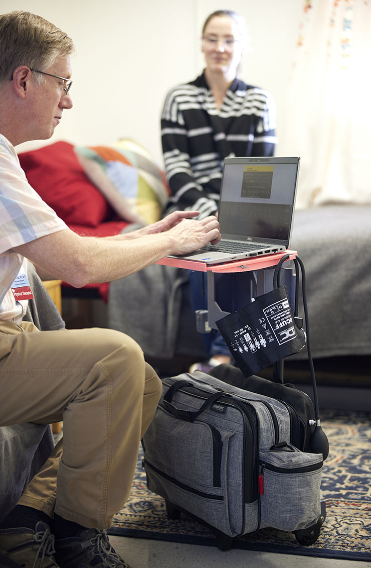 man using a portable workstation